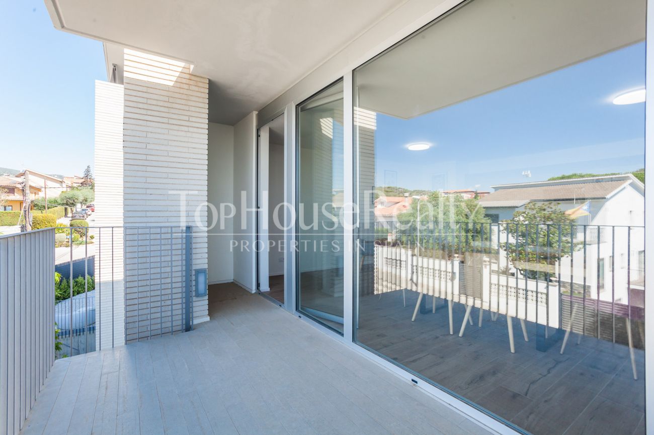 Apartment in a new building in the center of the village in the suburbs of Barcelona
