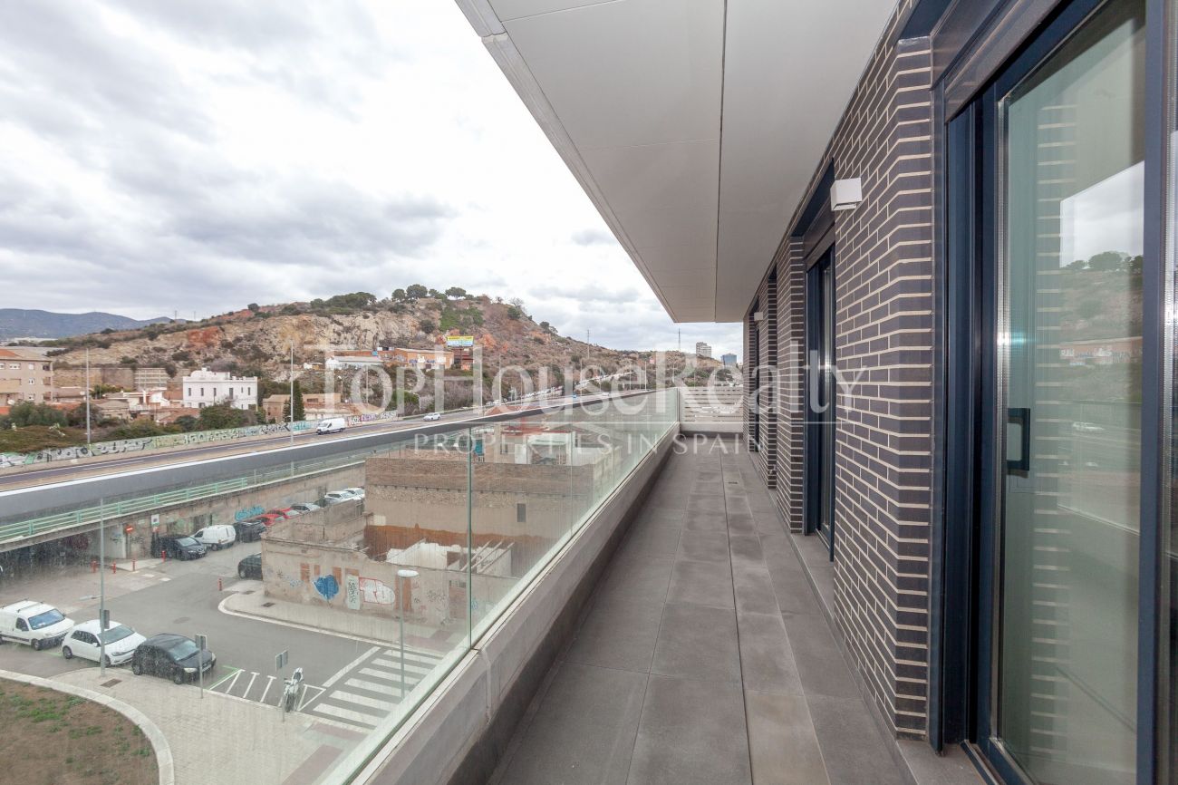 A new modern complex in the nearest suburb of Barcelona, a 5-minute walk from the sandy beach
