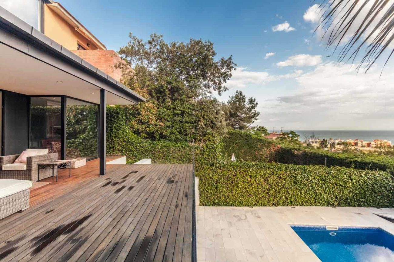 Sea view house in Castelldefels — cozy design with terraces and pool