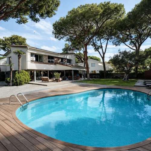 Villa for rent in Castelldefels Playa — second line to the sea with garden, pool and sauna